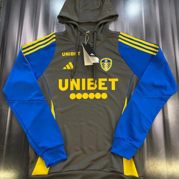 Buzo medio cierre con capucha del  leeds united talle S