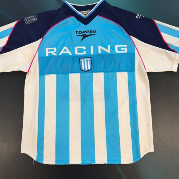 CAMISETA DE RACING USADA POR EL CHANCHI ESTEVEZ EN UNA GIRA QUE HIZO EL CLUB POR ESTADOS UNIDOS EN EL AÑO 2002